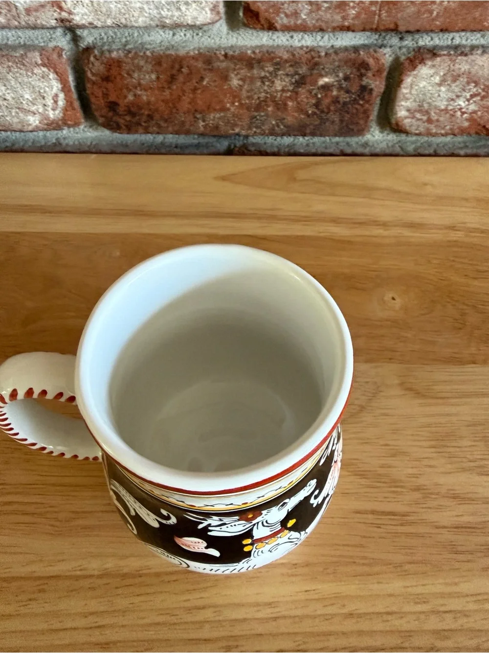 Sienna Italy Hand-Painted Ceramic Mug. Featuring white deer small chip